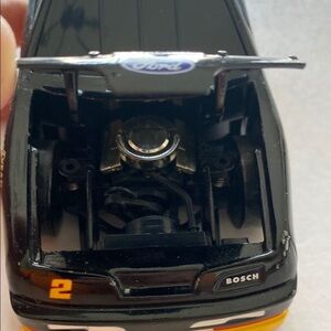 Ford Black diecast metal car model 8.5” long .